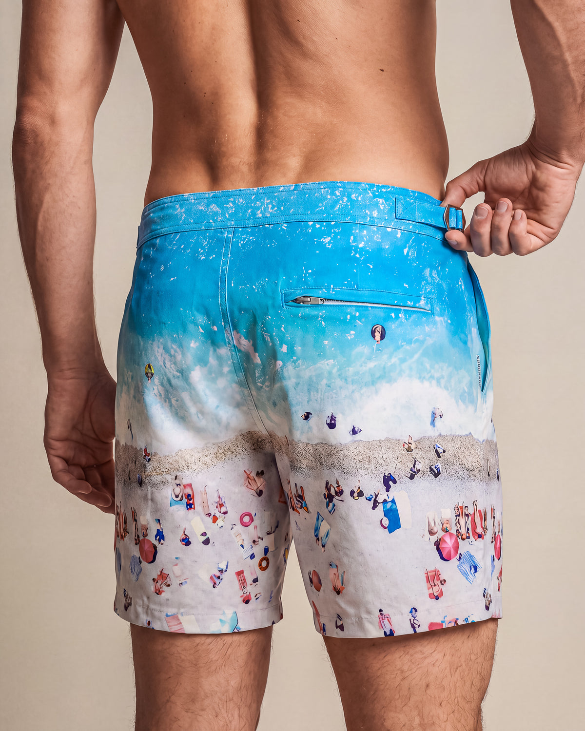 RWENZORI French Riviera photo print swim shorts — close-up rear view.
