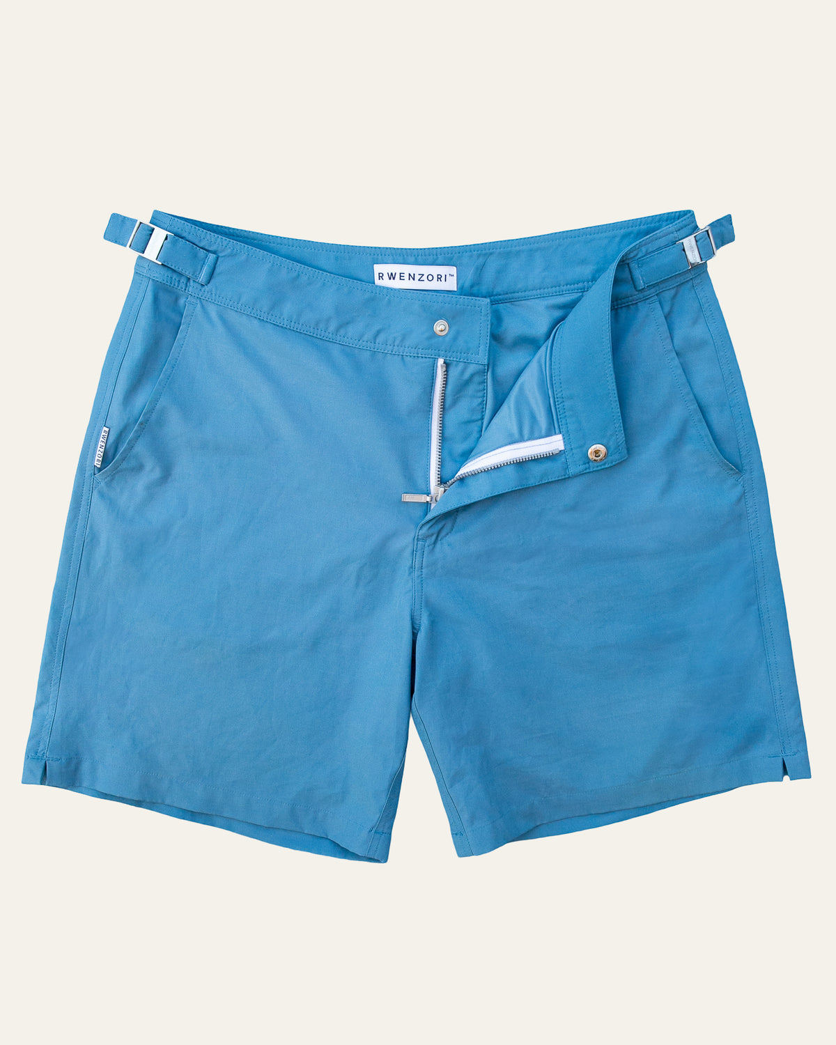 RWENZORI Mykonos Blue Performance Series swim shorts — full-frame front view.