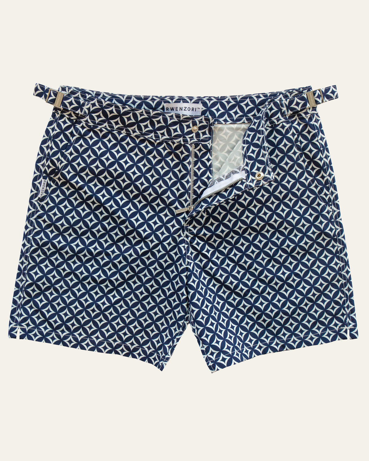 Flat lay front view of RWENZORI Palladio Venezia diamond print swim shorts on a clean background.