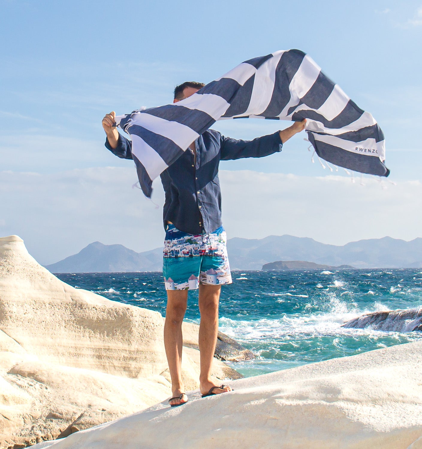 Rwenzori turkish towel double band med-blue (navy) on rocks in greece vacation. Navy.