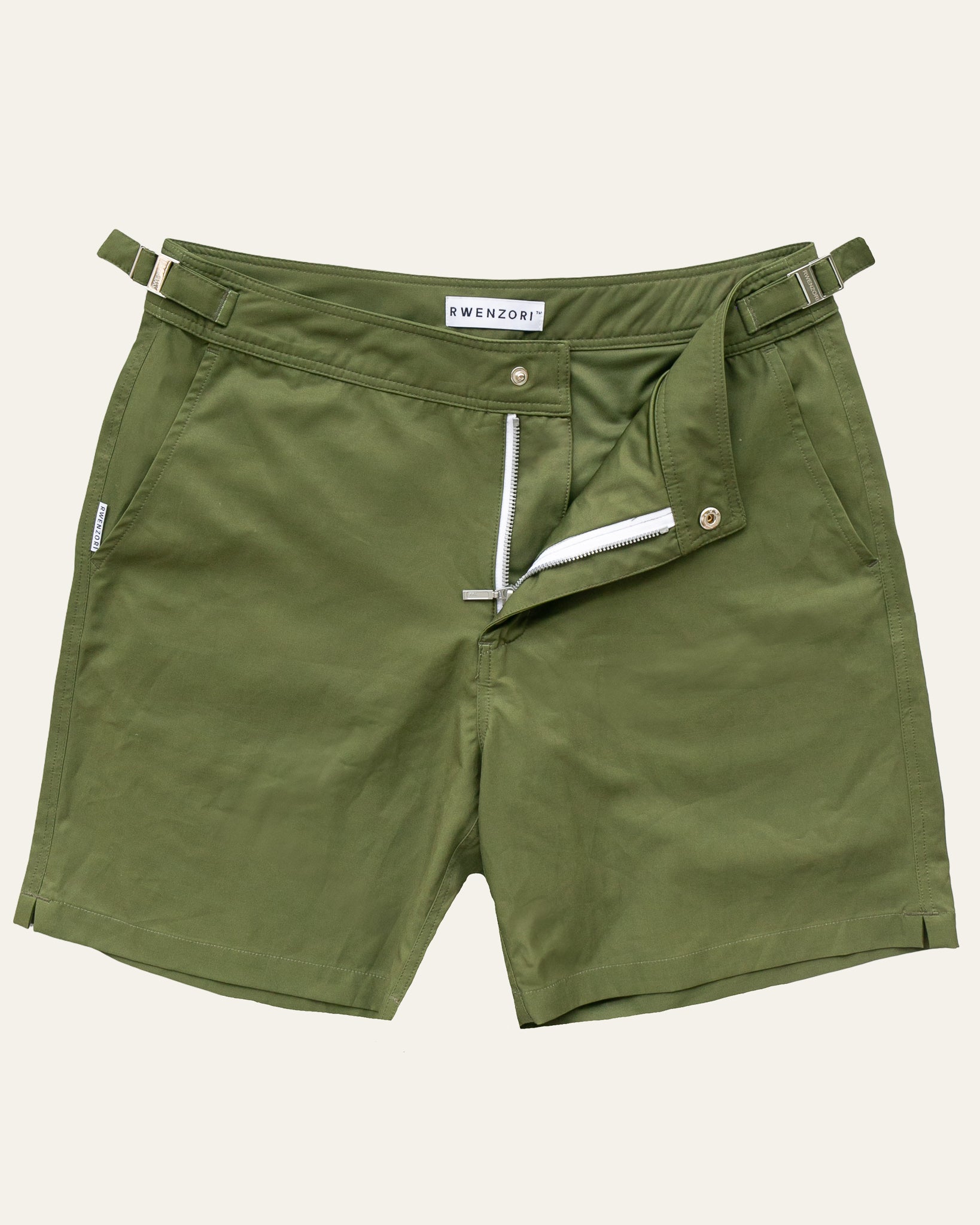RWENZORI Tuscan Olive Performance Series swim shorts — flat lay.