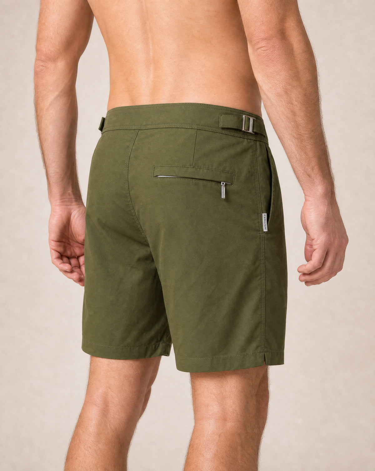 RWENZORI Tuscan Olive Performance Series swim shorts — close-up rear view.