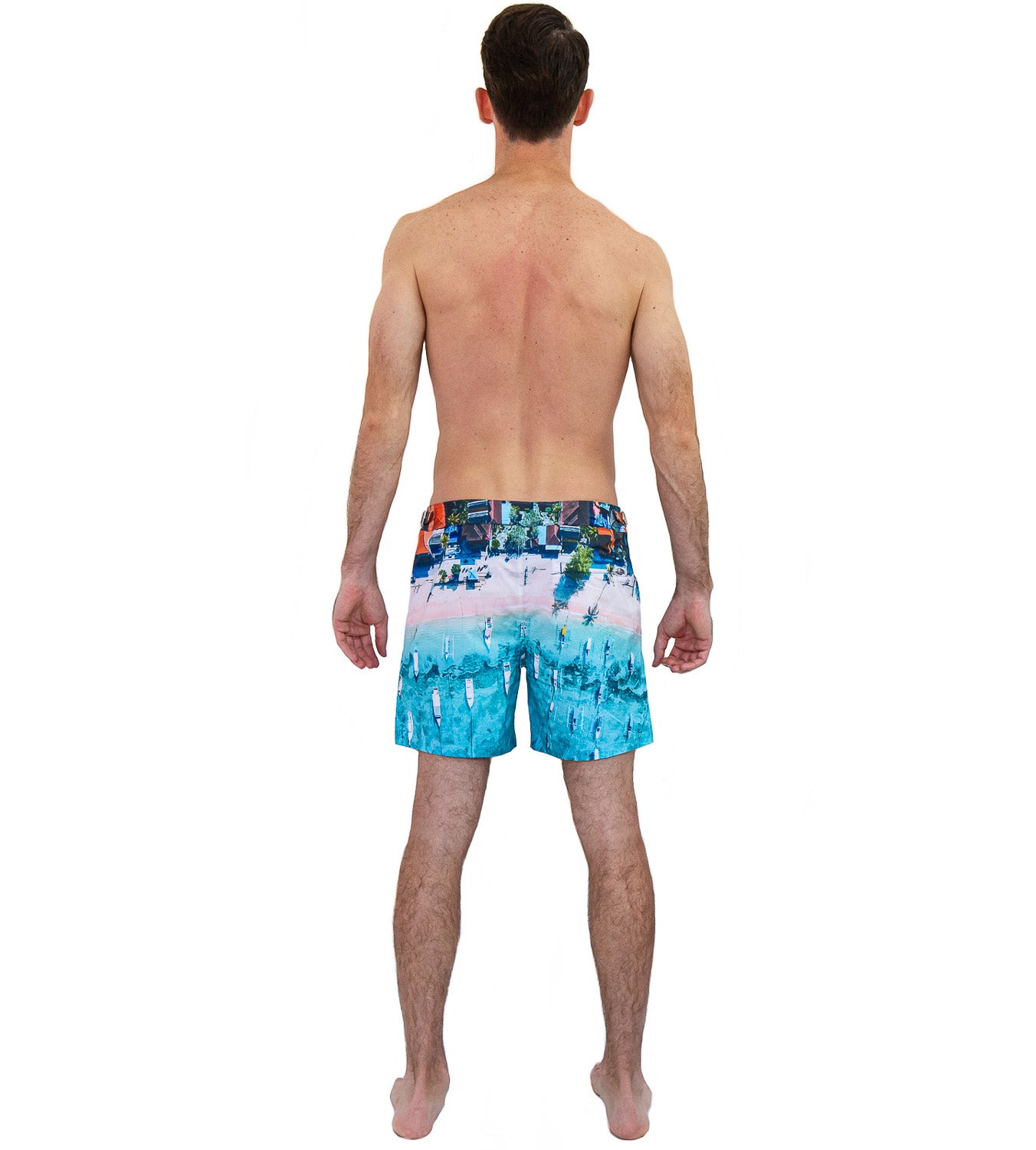 Back view of Rwenzori Bali Boats swim shorts featuring zip-enclosed rear pocket – secure design for travel and resort wear.