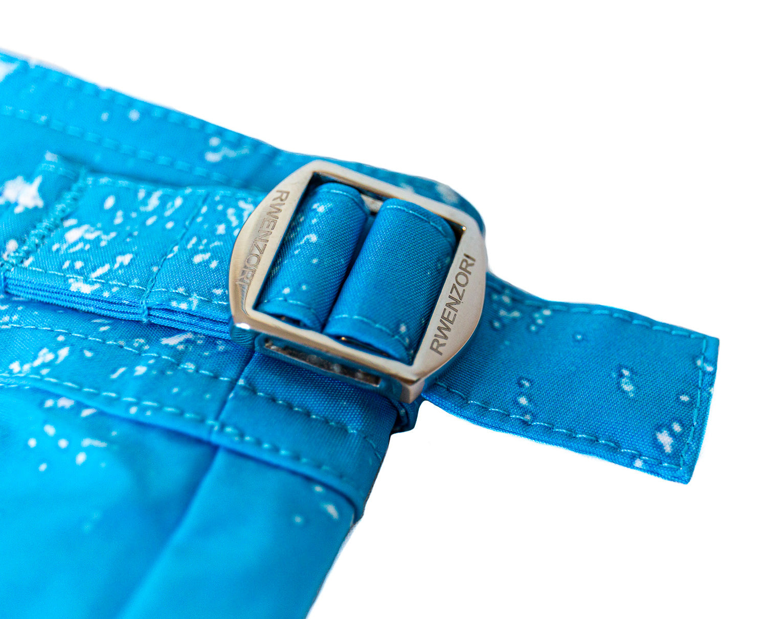 Close-up of French Riviera swim shorts stainless steel adjustable side buckles.