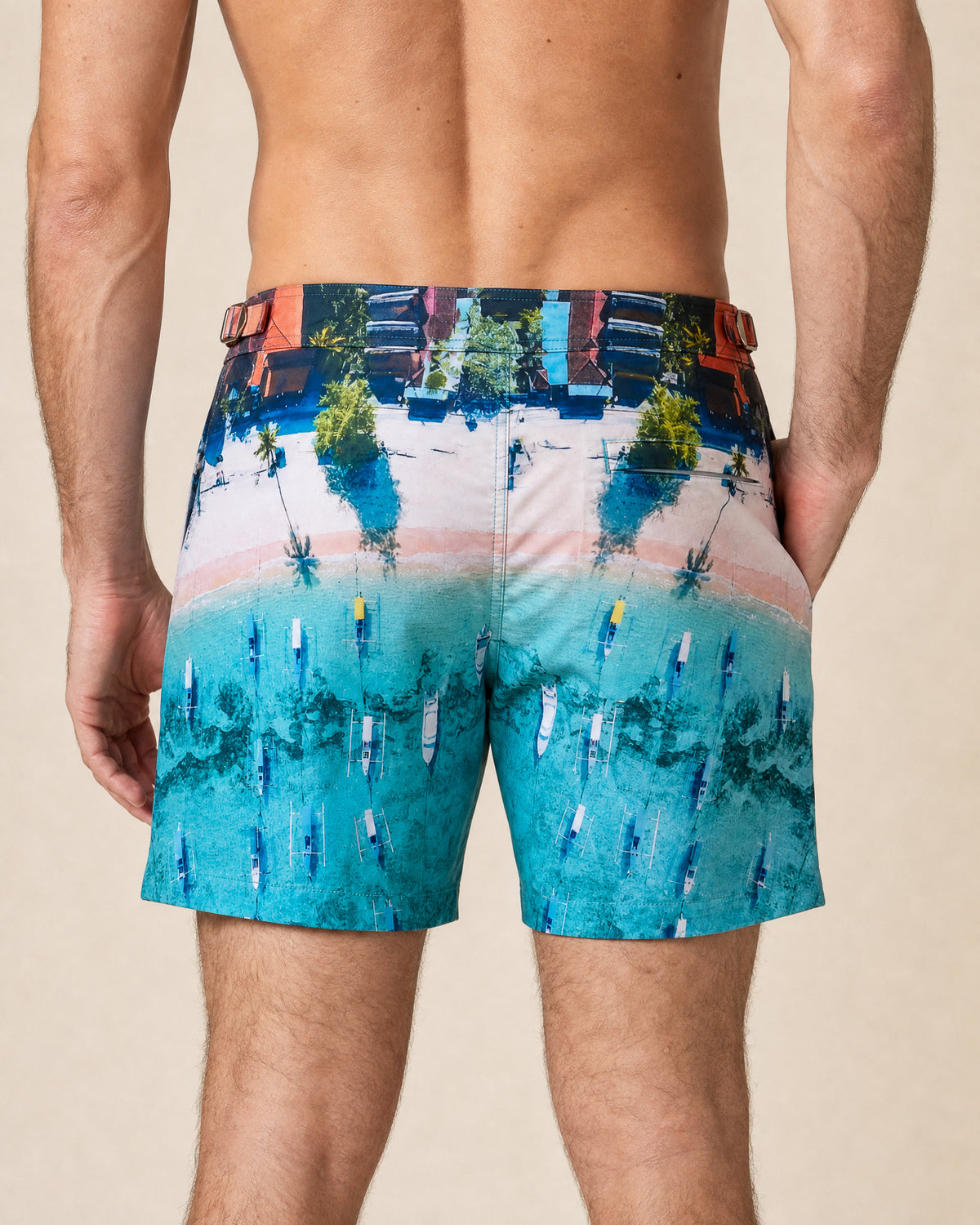 RWENZORI Bali boats photo print swim trunks — close-up rear view