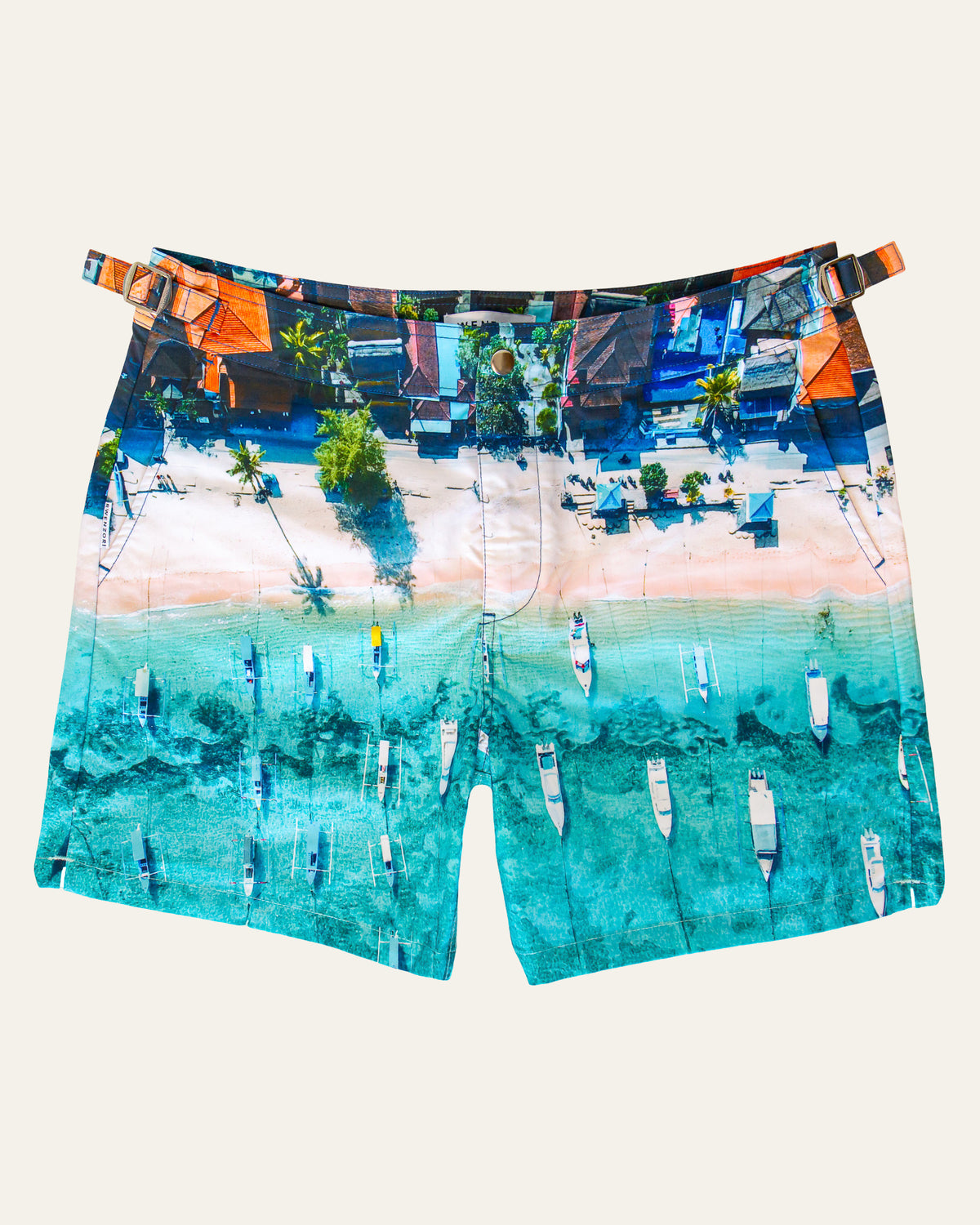 Flat lay front view of RWENZORI Bali photo print swim shorts on a clean background.