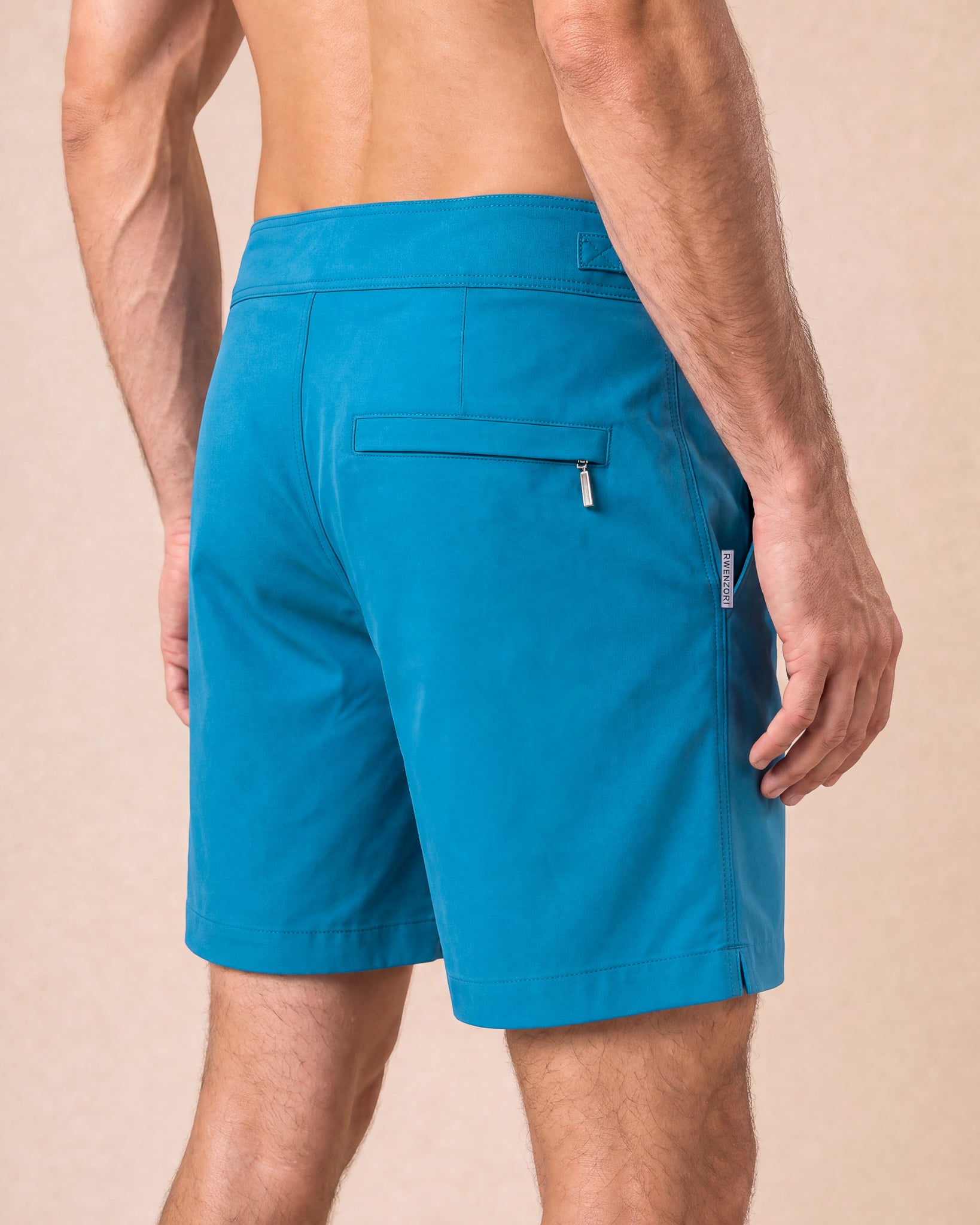 RWENZORI Mykonos Blue Performance Series swim shorts — close-up rear view.
