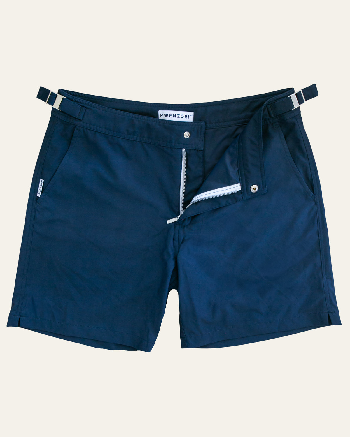 RWENZORI Nautic Navy Performance swim trunks flat laid.