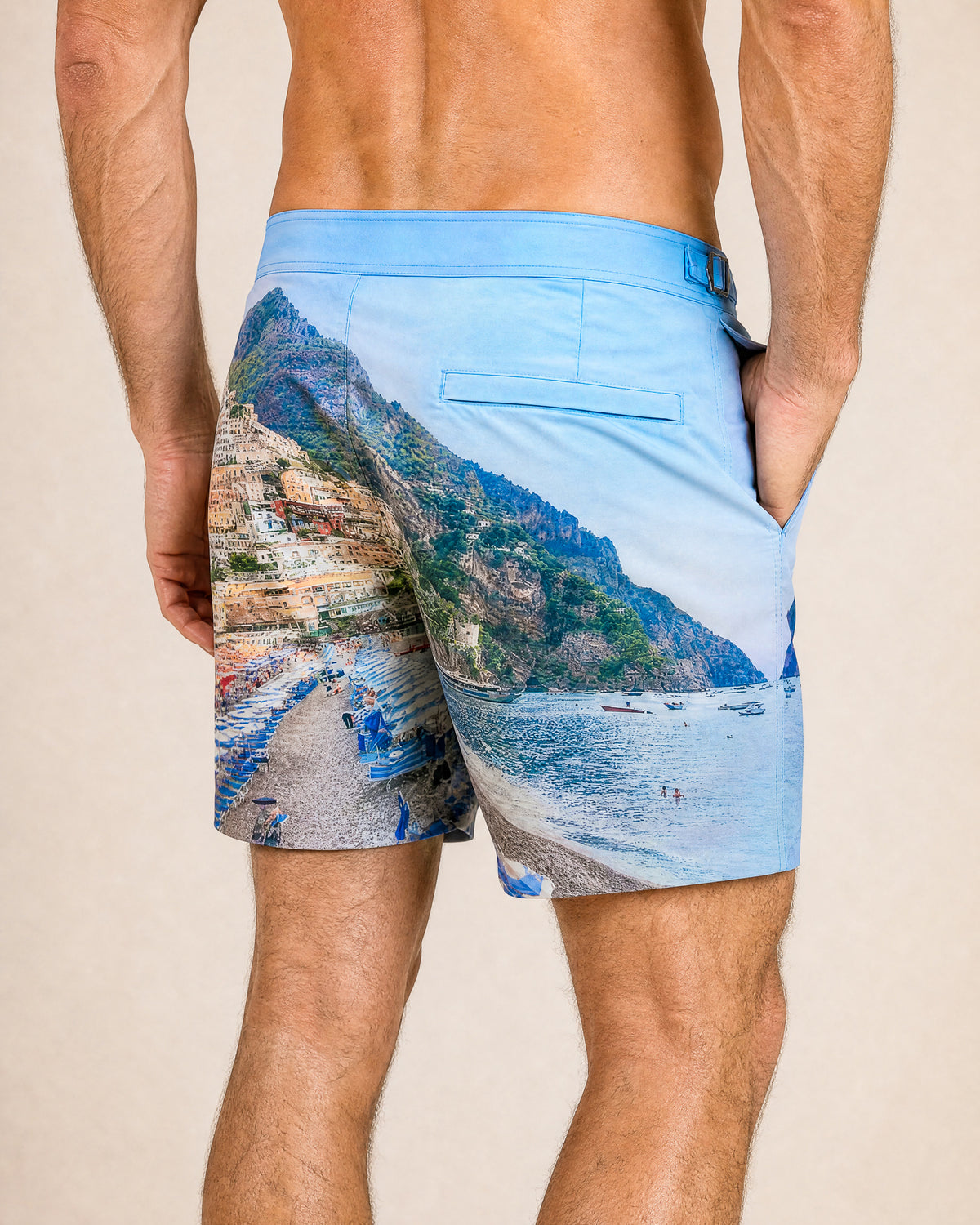 RWENZORI Positano photo print swim shorts — close-up rear view.