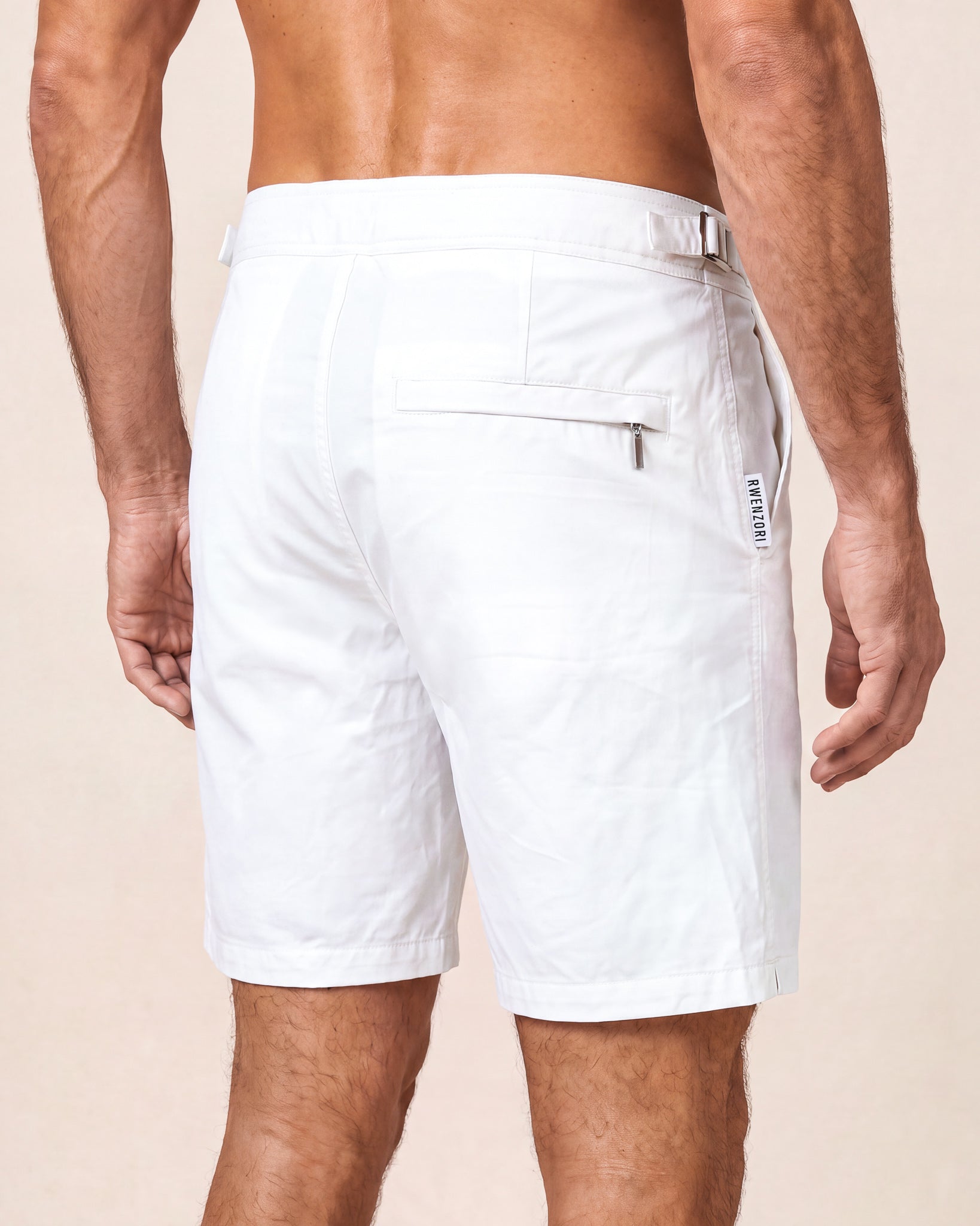 RWENZORI Riviera White Performance Series swim shorts — close-up rear view.