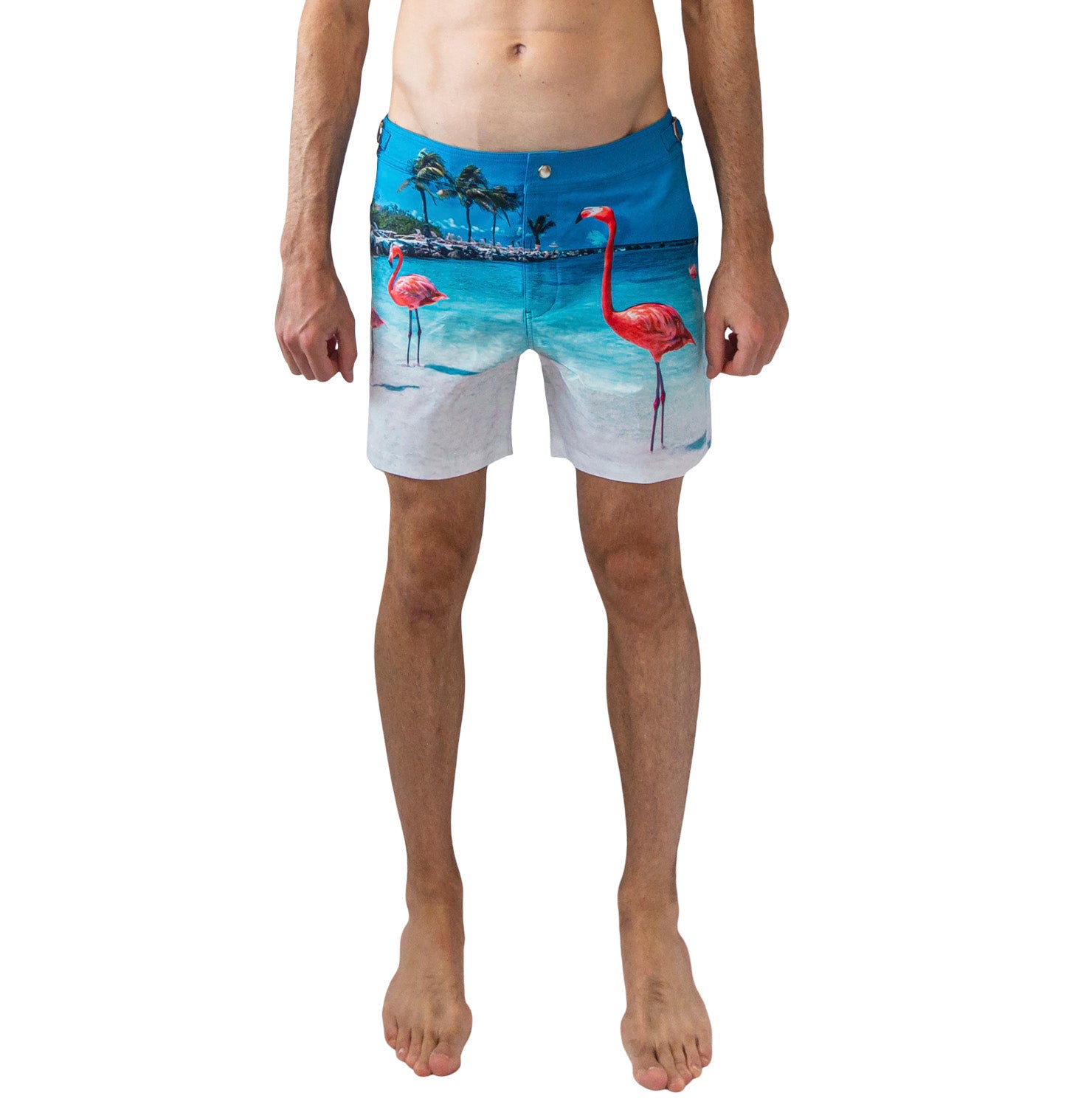 men's tailored photo-print swim trunk featuring pink flamingos from Aruba worn by model