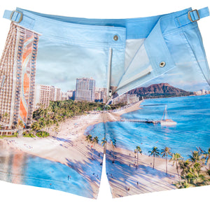 Rwenzori Waikiki men’s swim shorts featuring Hawaii beach photo print, tailored mid-length design