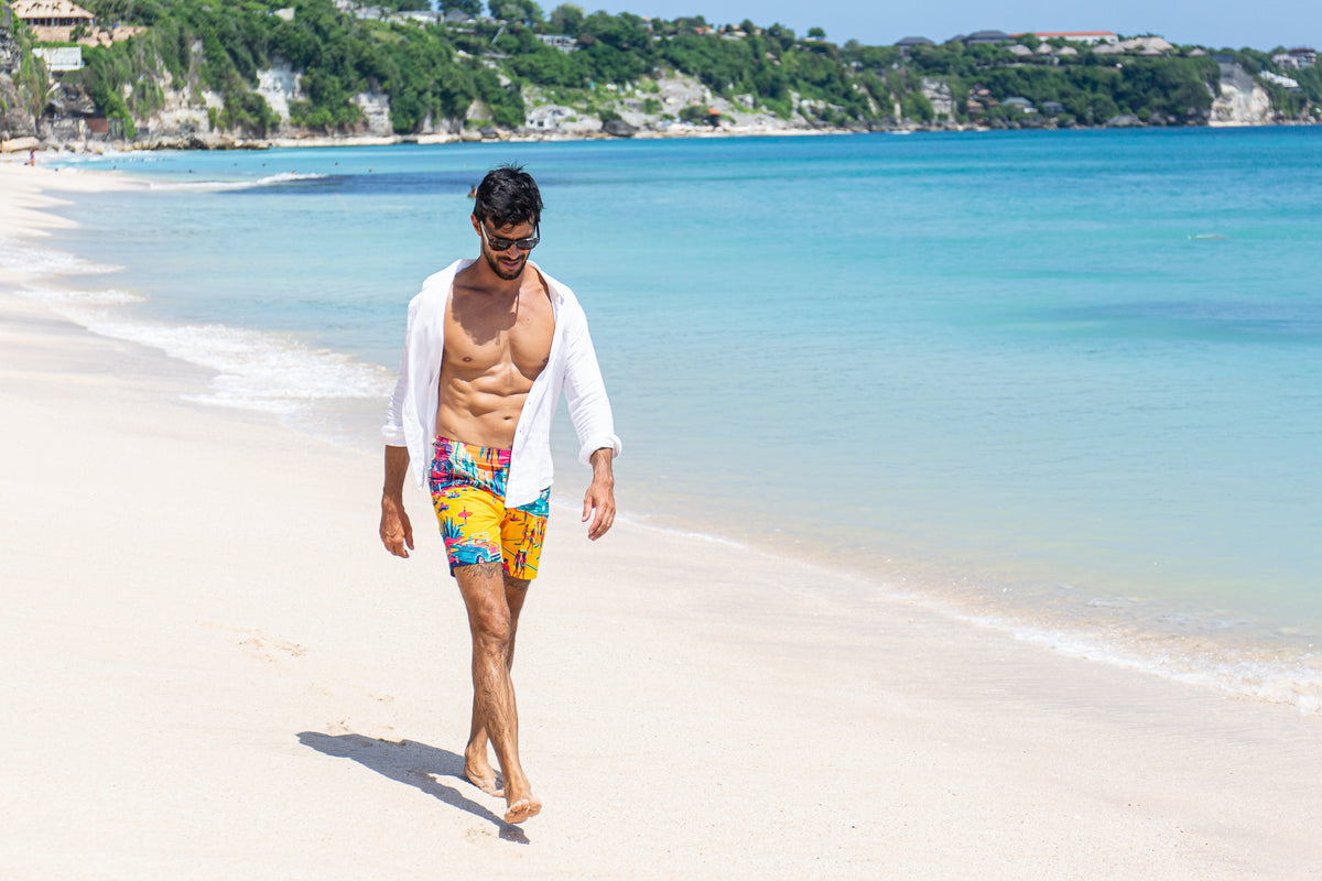 Rwenzori new swim trunks MIAMI worn by man at beach.
