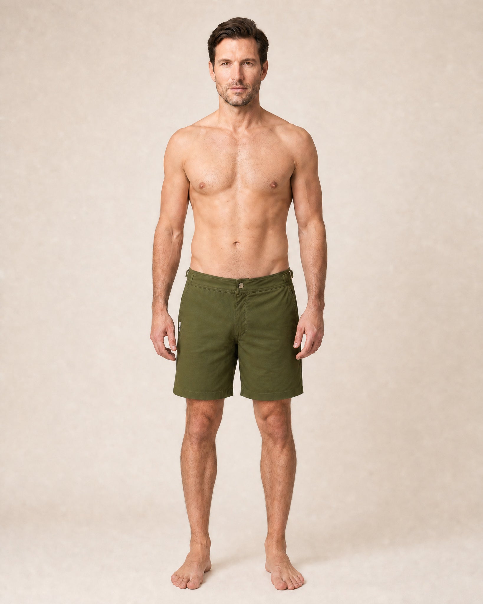 RWENZORI Tuscan Olive Performance Series swim shorts — full-frame front view.