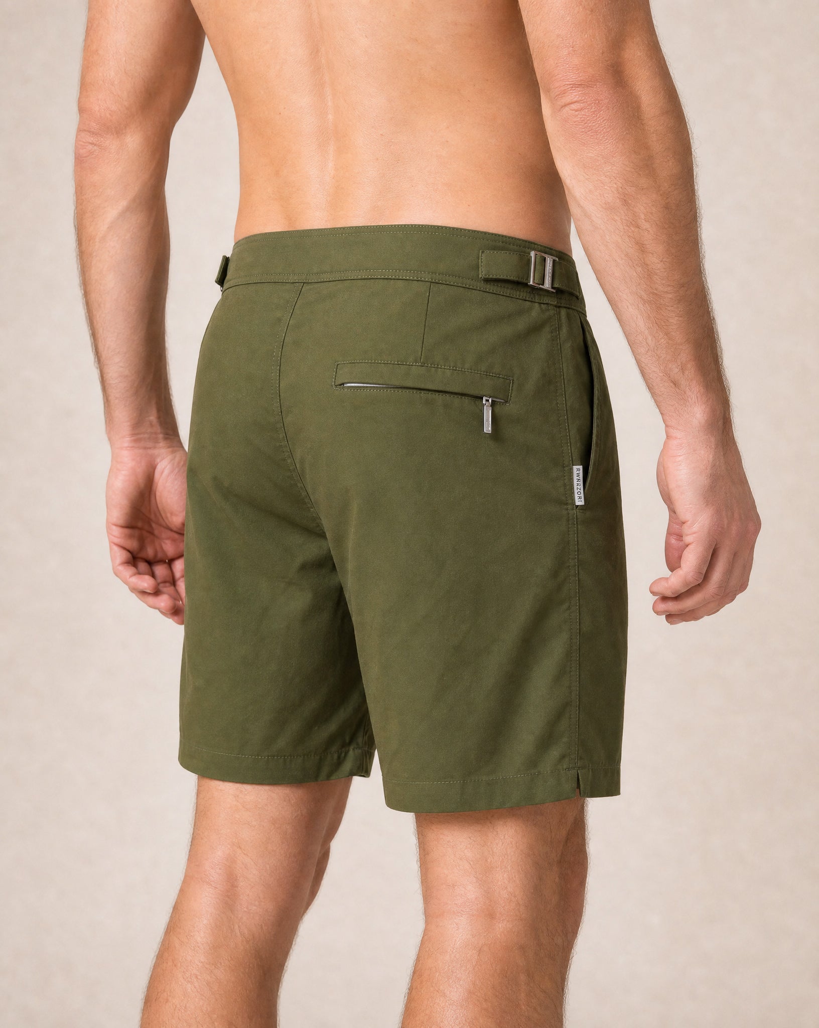 RWENZORI Tuscan Olive Performance Series swim shorts — close-up rear view.