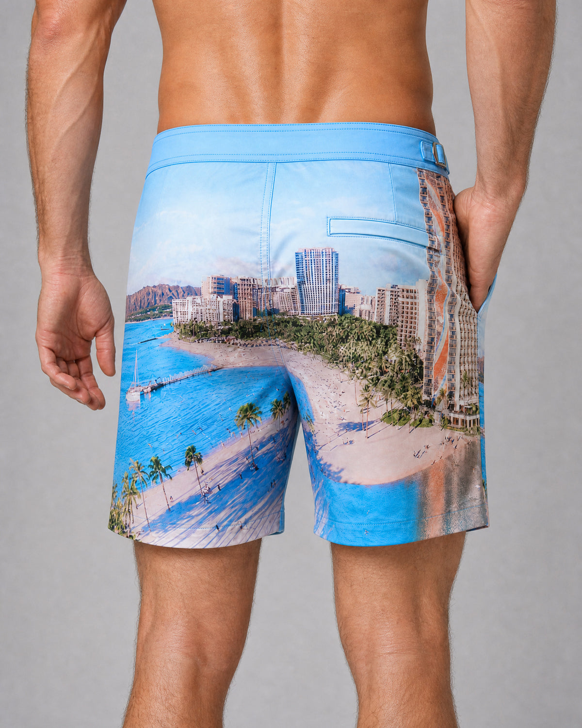 RWENZORI Waikiki photo print swim shorts — close-up rear view.