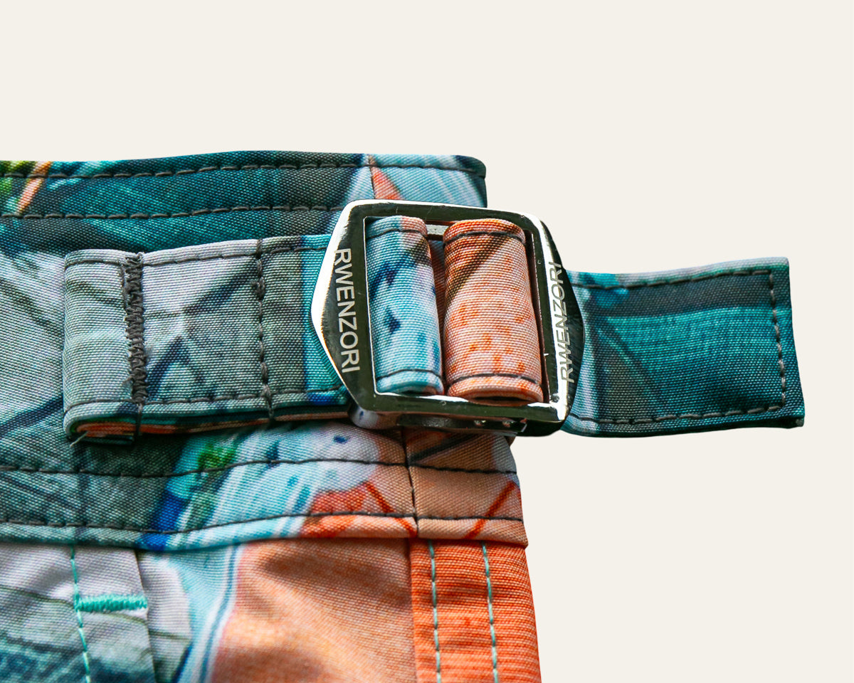 Rwenzori photo print swim trunks finer details - Bali Boats side stainless buckles.