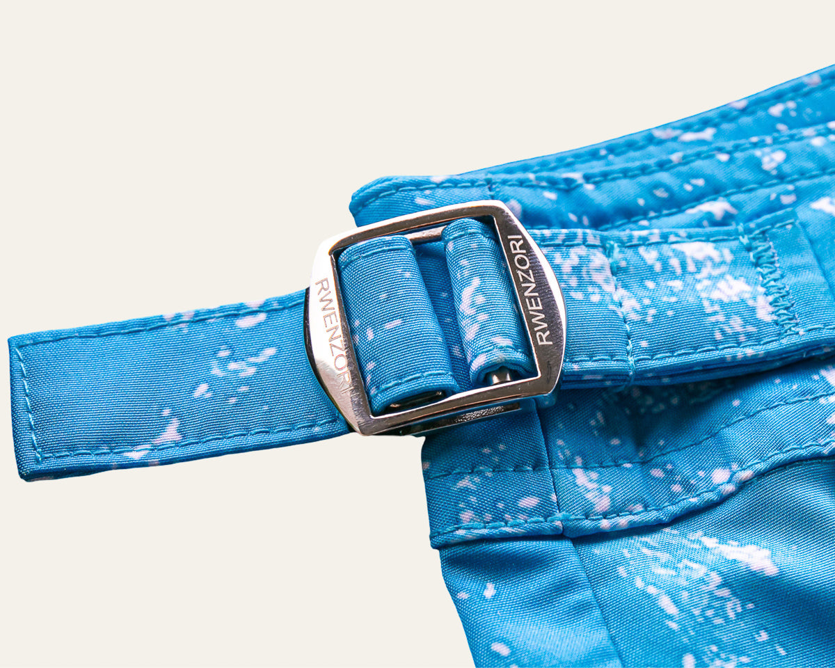 Rwenzori photo print swim trunks finer details - French Riviera side stainless buckles.