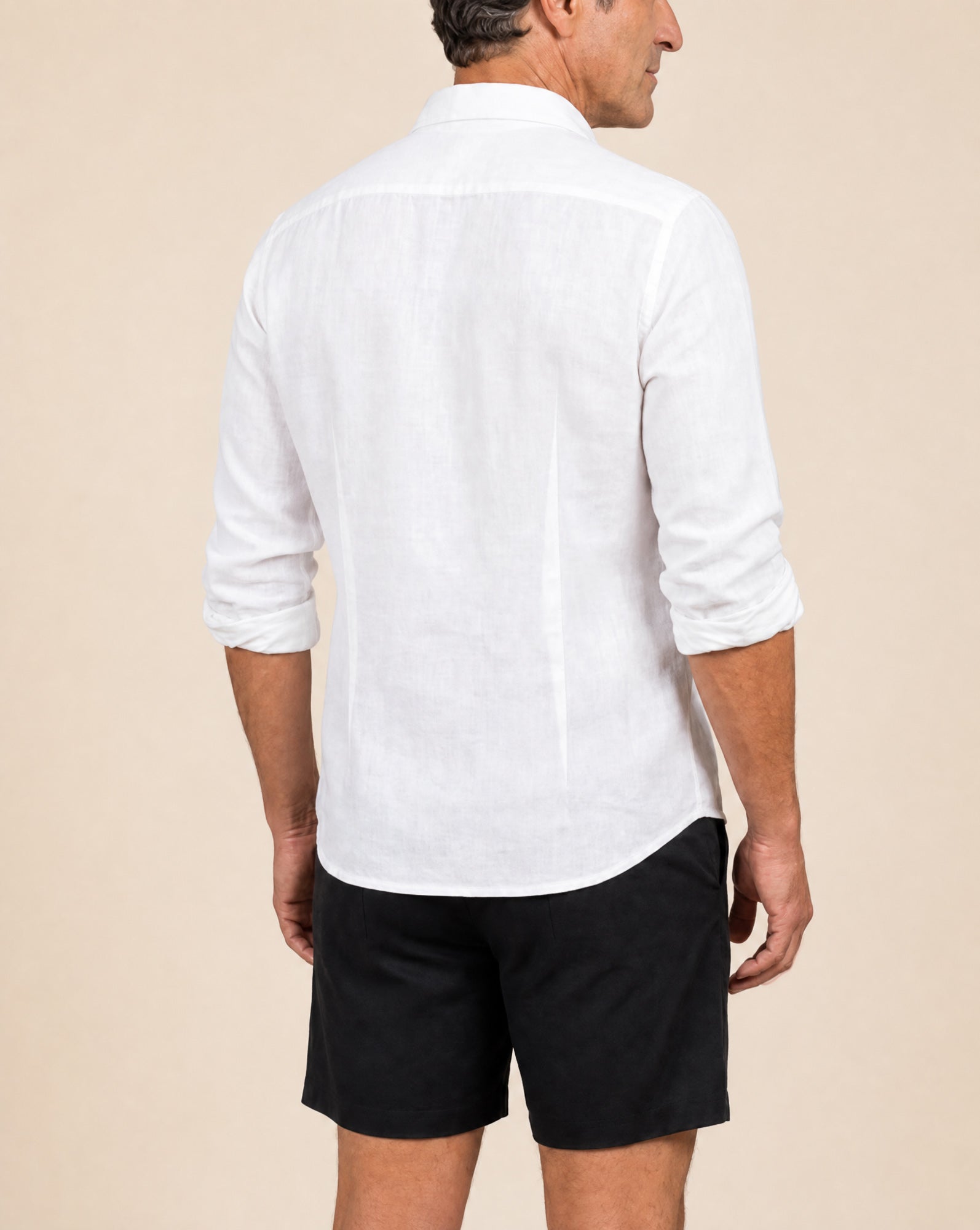 Back view of the tailored fit on Rwenzori men's white linen shirt