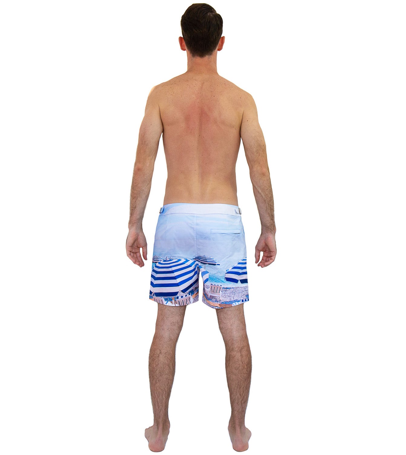 Rwenzori St Tropez swim shorts back view – men's tailored swim trunks featuring photo print of the French Riviera and St Tropez beach and umbrellas.