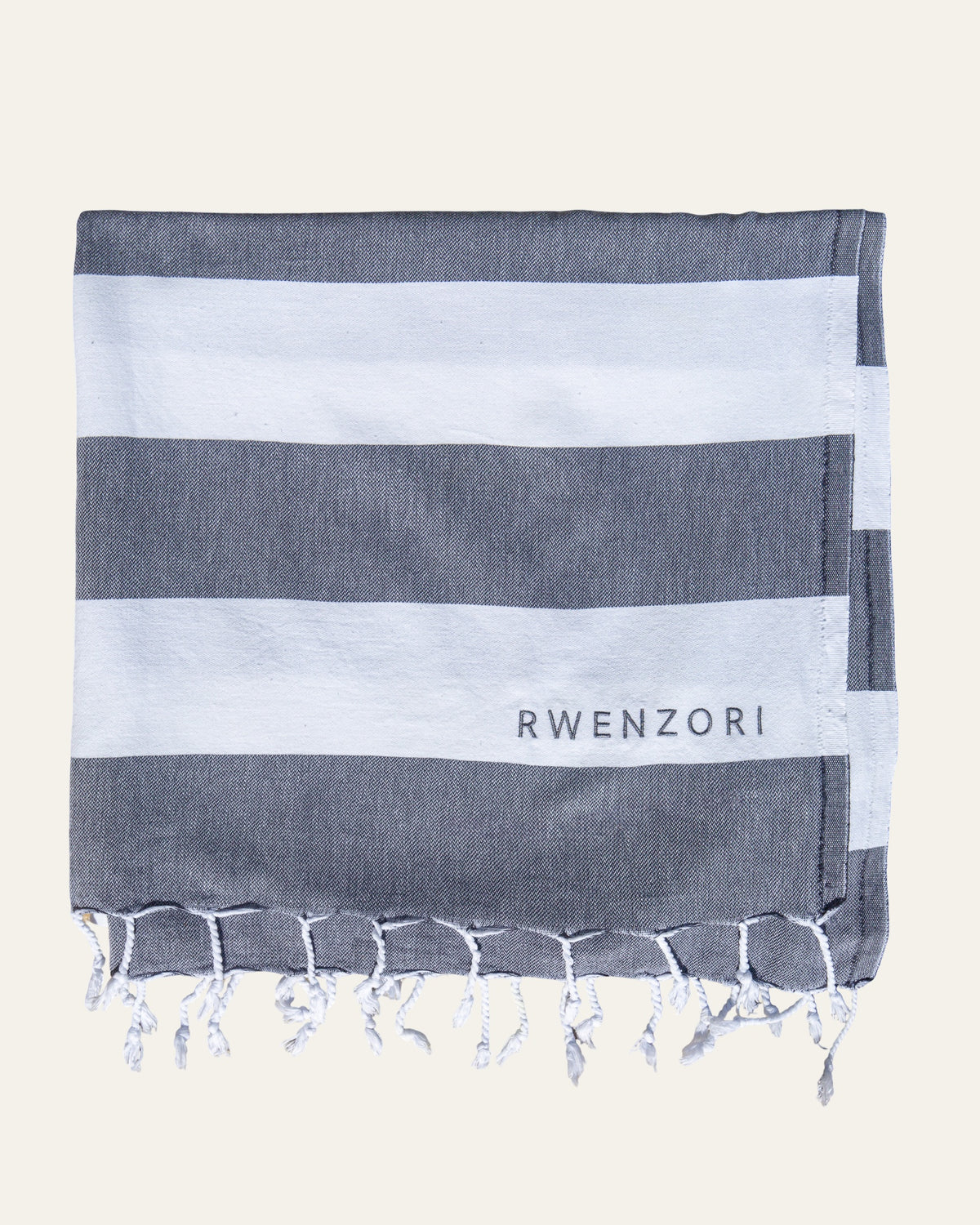 Rwenzori Turkish Towel - Coastal Charcoal in lightweight Turkish cotton, perfect for travel.