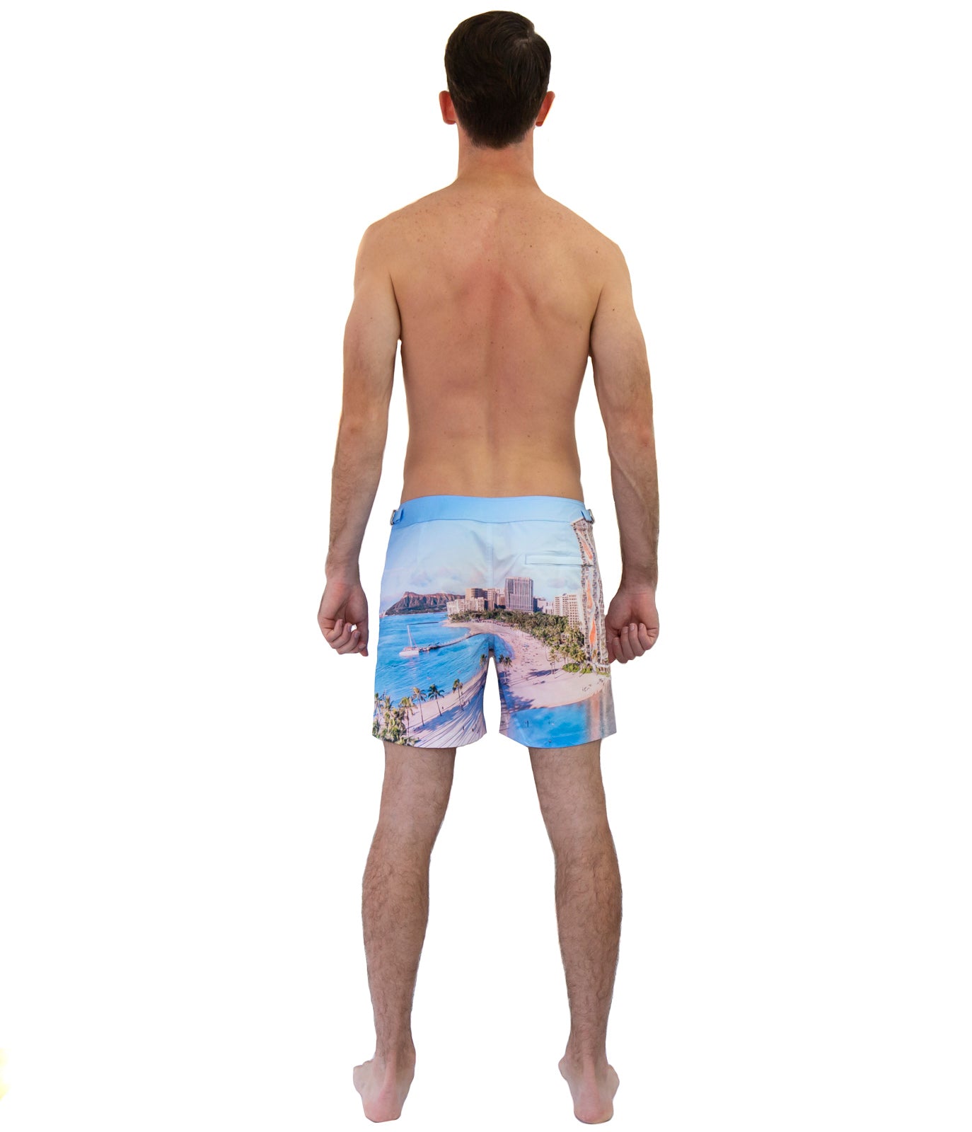Back view of Rwenzori Waikiki men’s swim shorts with quick-dry recycled fabric and island print
