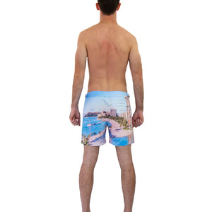 Back view of Rwenzori Waikiki men’s swim shorts with quick-dry recycled fabric and island print
