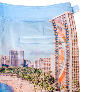 Close-up of Rwenzori Waikiki swim shorts showing vivid photo print and premium fabric texture including rear pocket